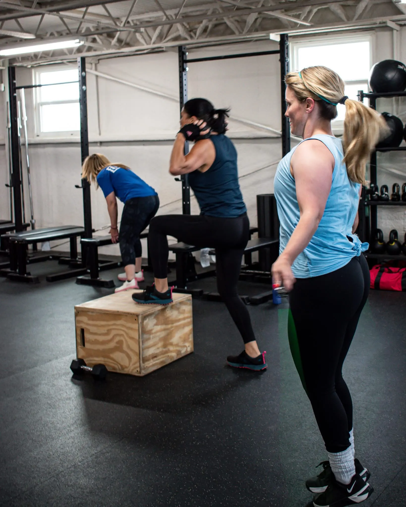 CrossFit 806 members training together through box step-ups